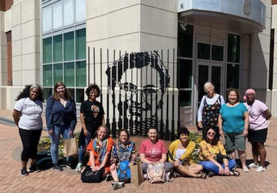 people in front of Rosa Parks mural