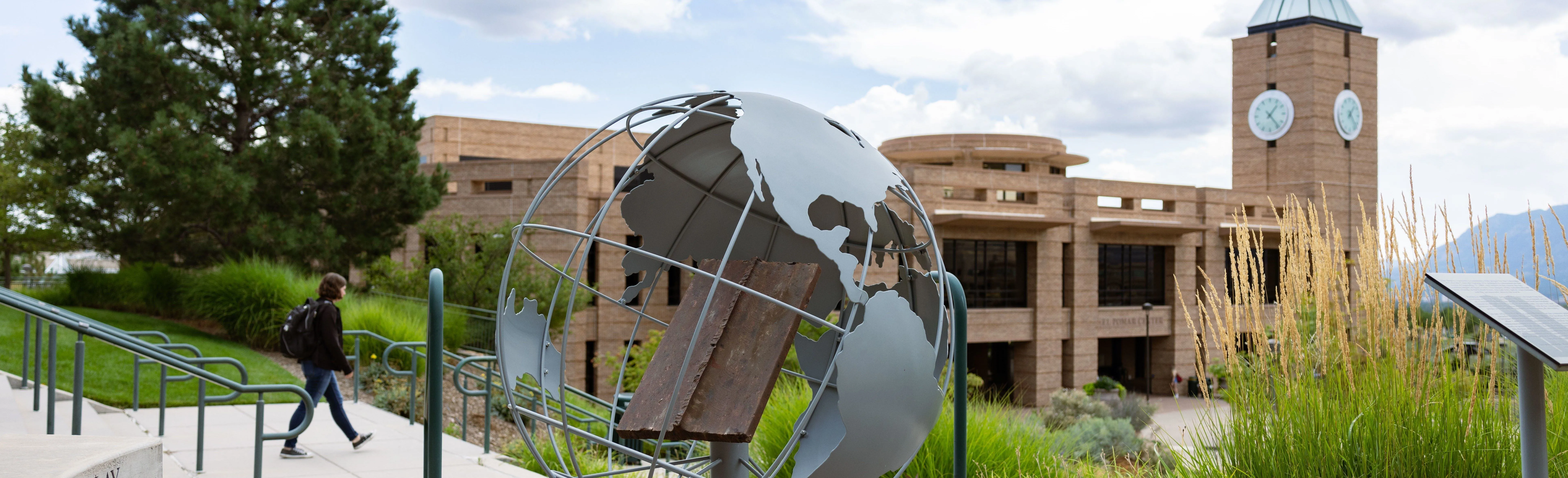 globe and clock tower